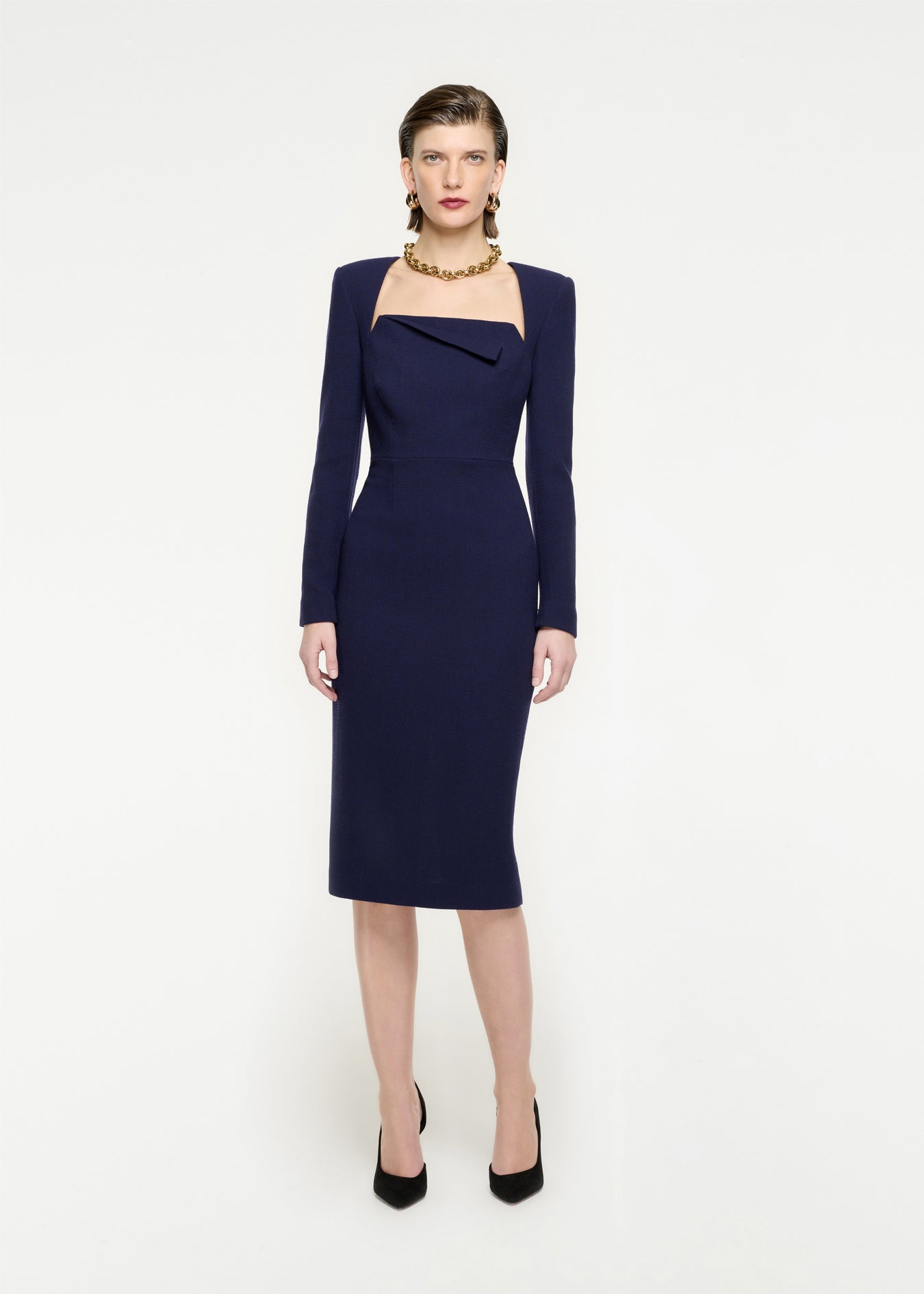 Woman wearing the Long Sleeve Wool Crepe Midi Dress in Navy