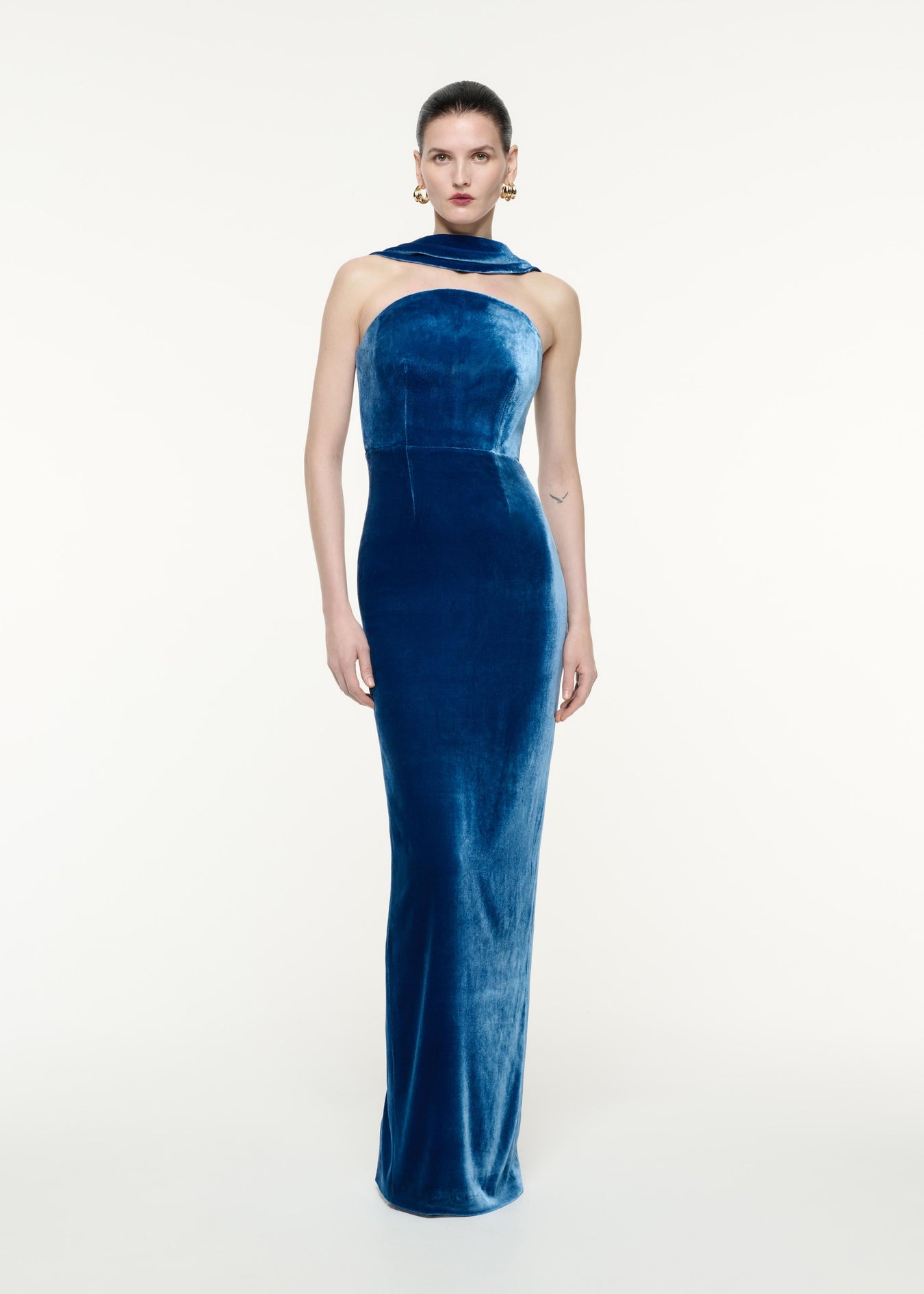 A front view image of a model wearing the Velvet Sash Gown in Navy