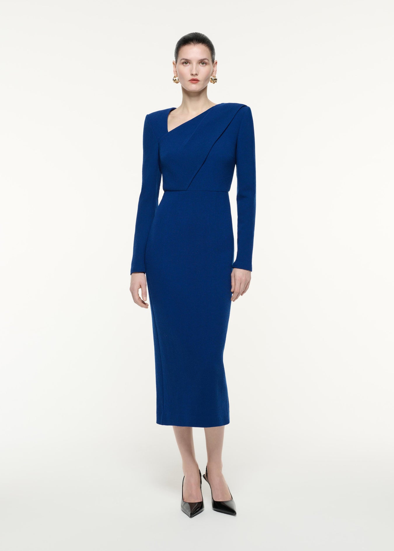 A front view image of a model wearing the Long Sleeve Wool Crepe Midi Dress in Navy