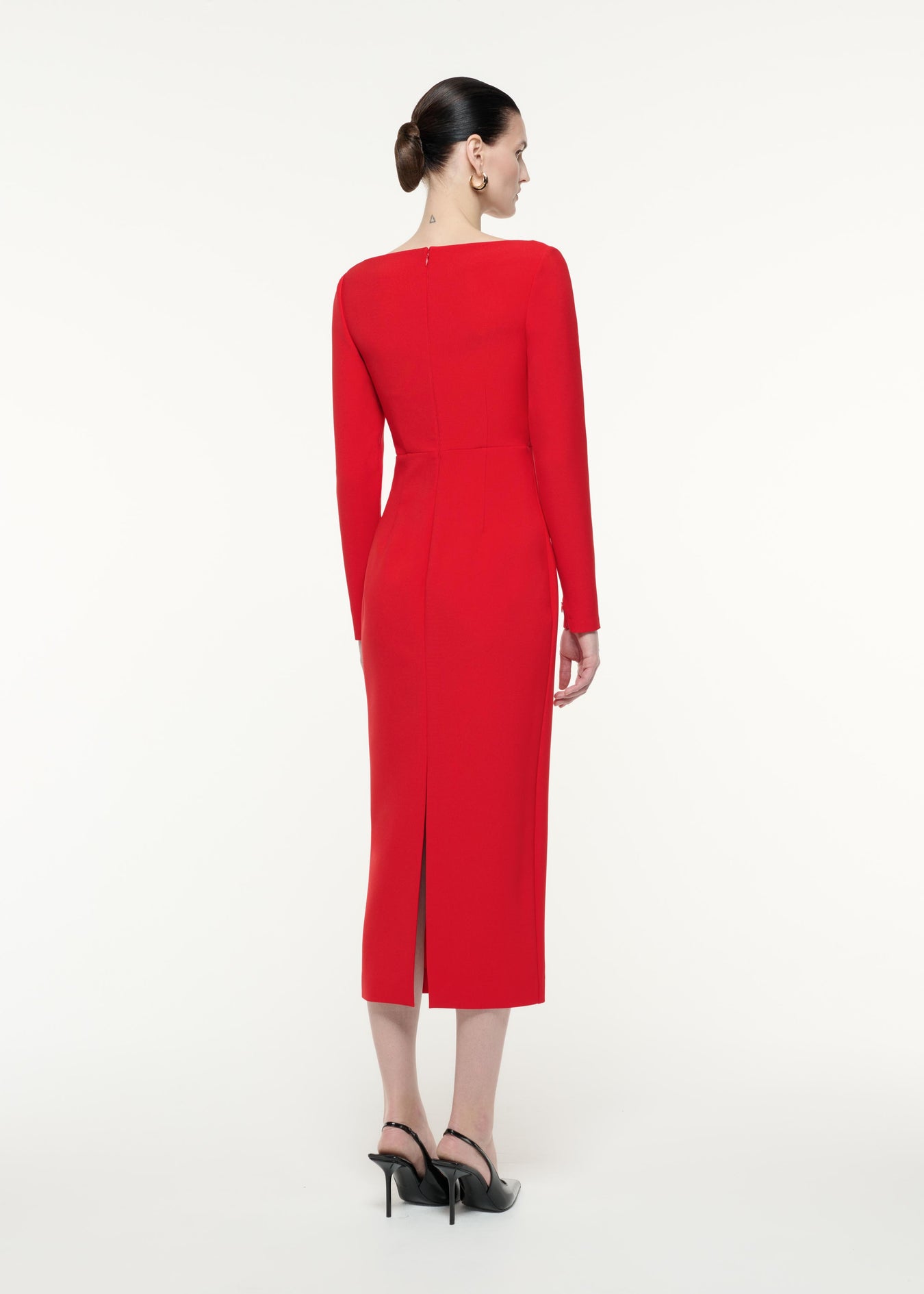 A back view image of a model wearing the Long Sleeve Crepe Midi Dress in Red