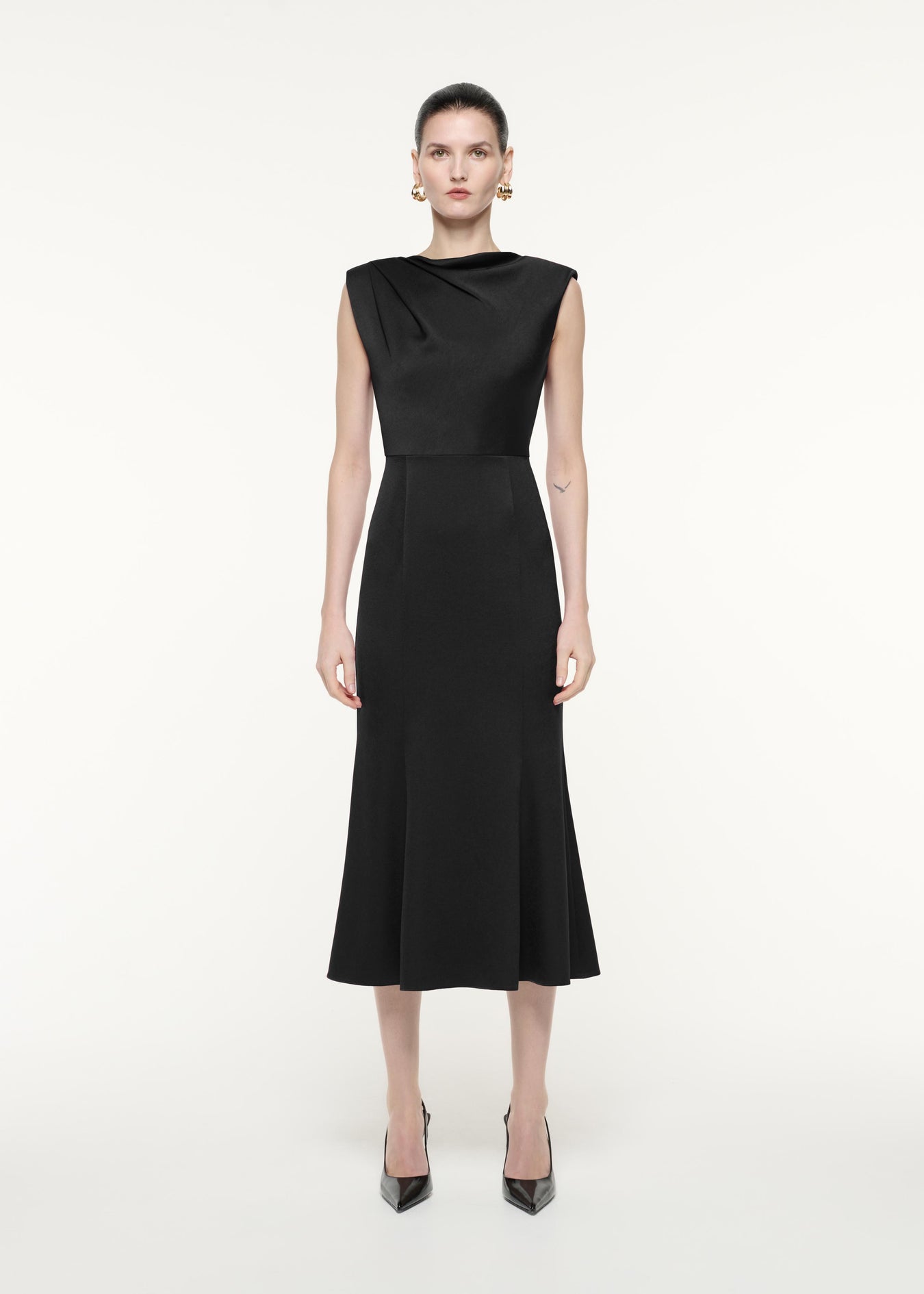 A front view image of a model wearing the Satin Crepe Midi Dress in Black
