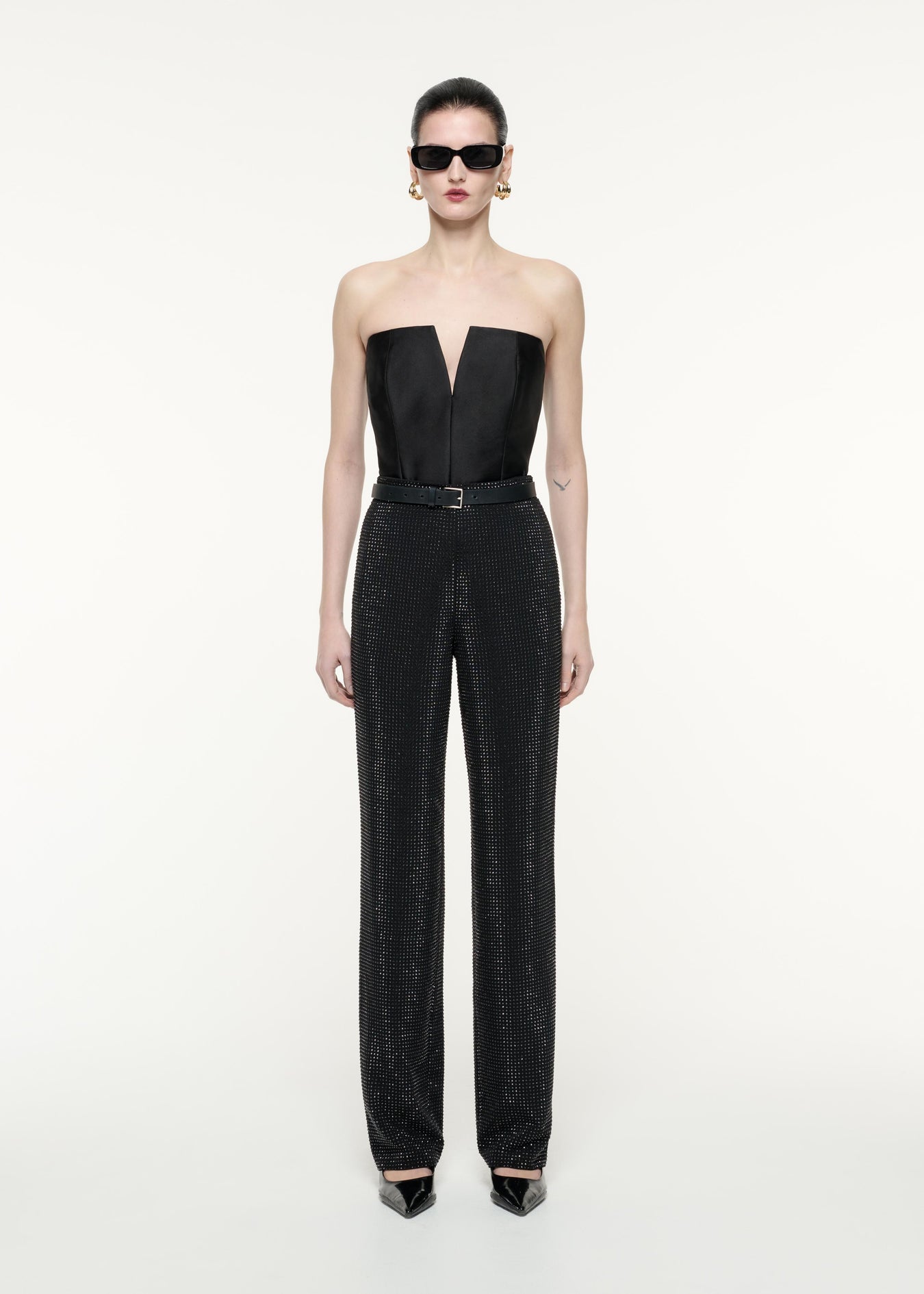 A front view image of a model wearing the Diamante Trouser in Black