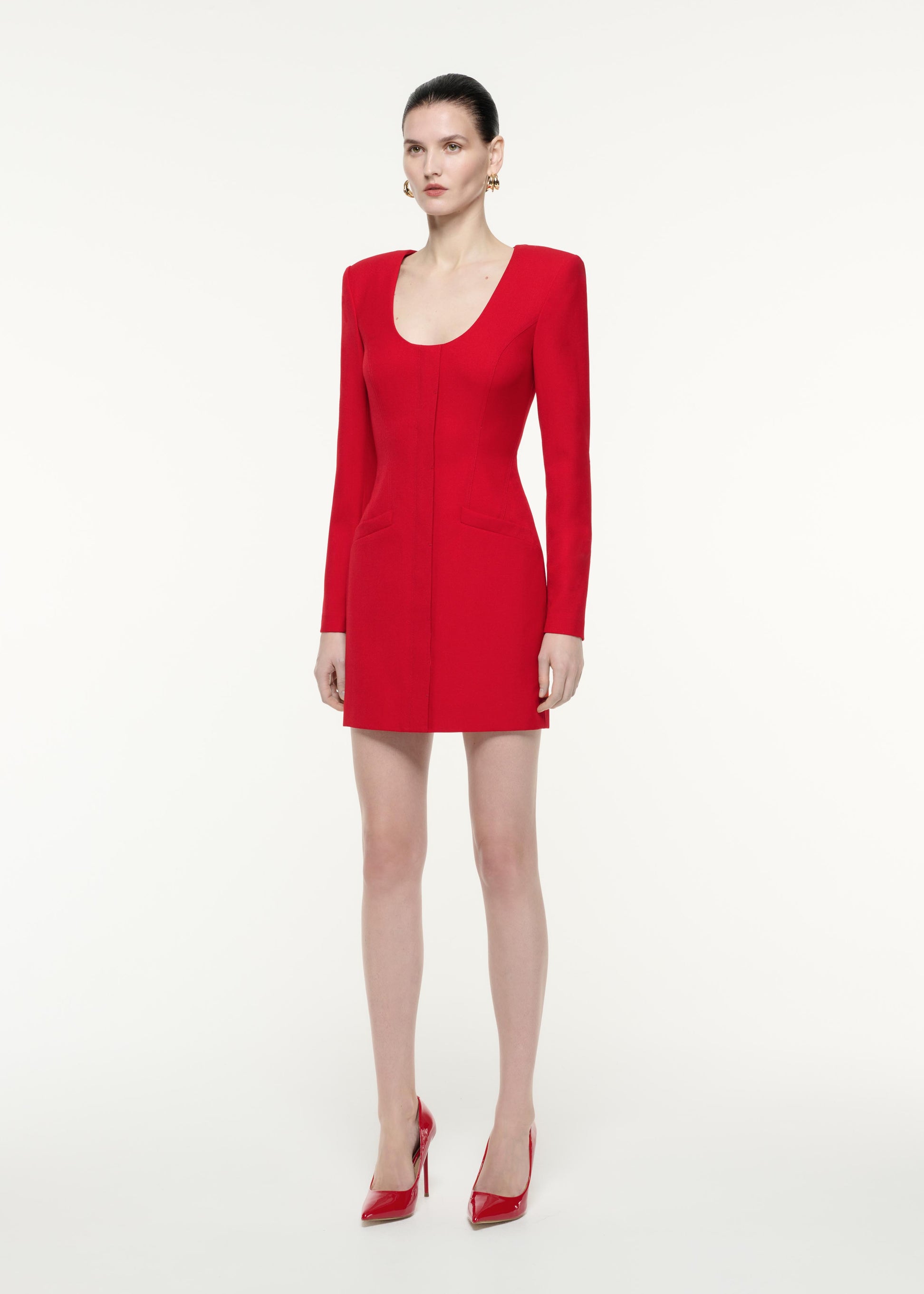 A side view image of a model wearing the Long Sleeve Tailoring Wool Mini Dress in Red