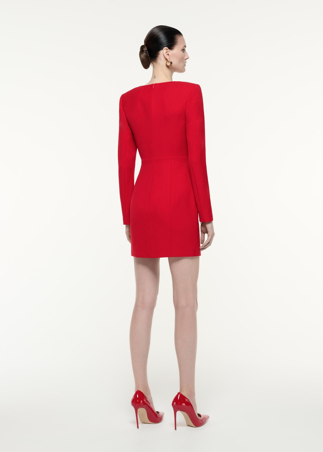 A back view image of a model wearing the Long Sleeve Tailoring Wool Mini Dress in Red