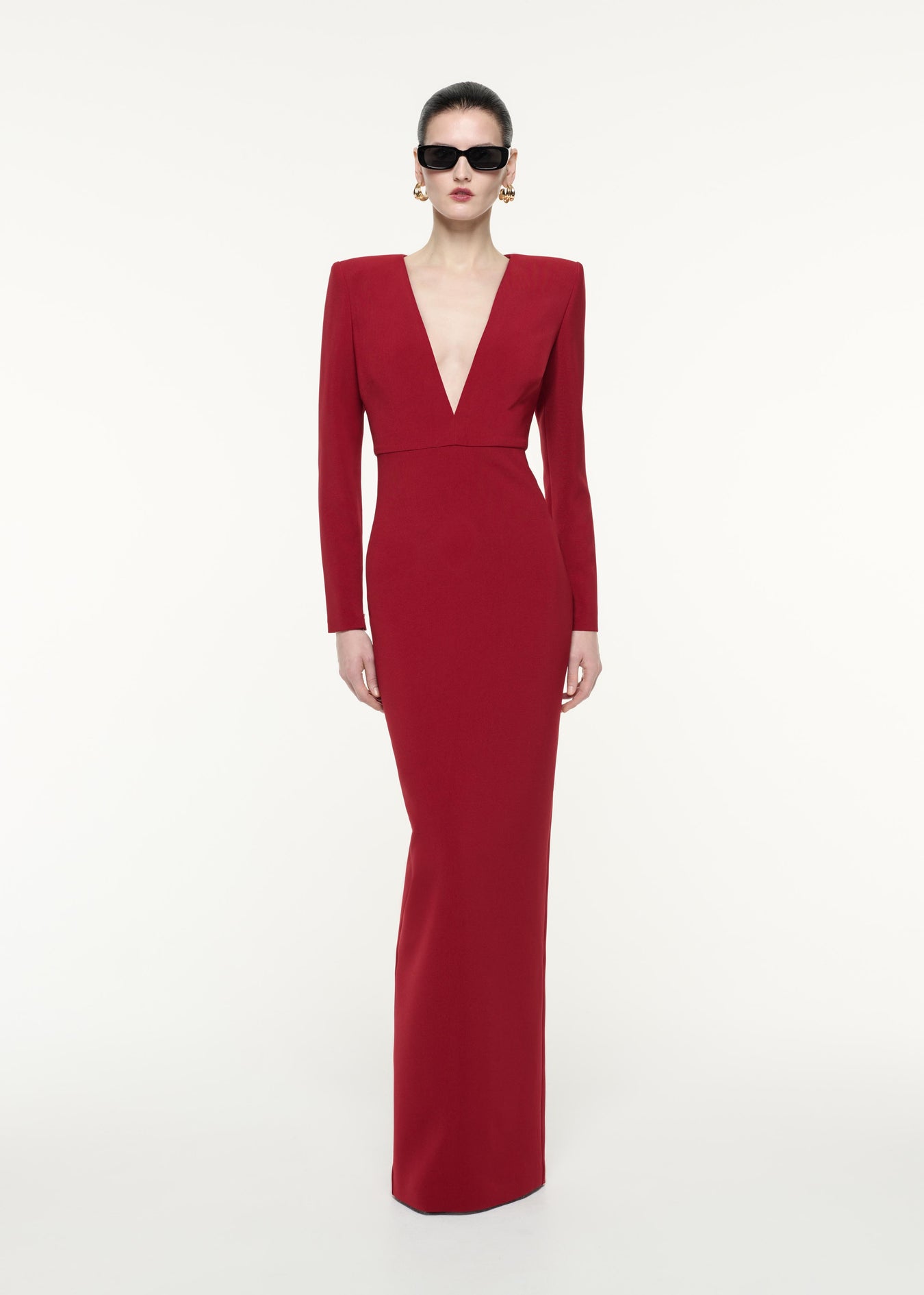 A front view image of a model wearing the Long Sleeve Crepe Maxi Dress in Red