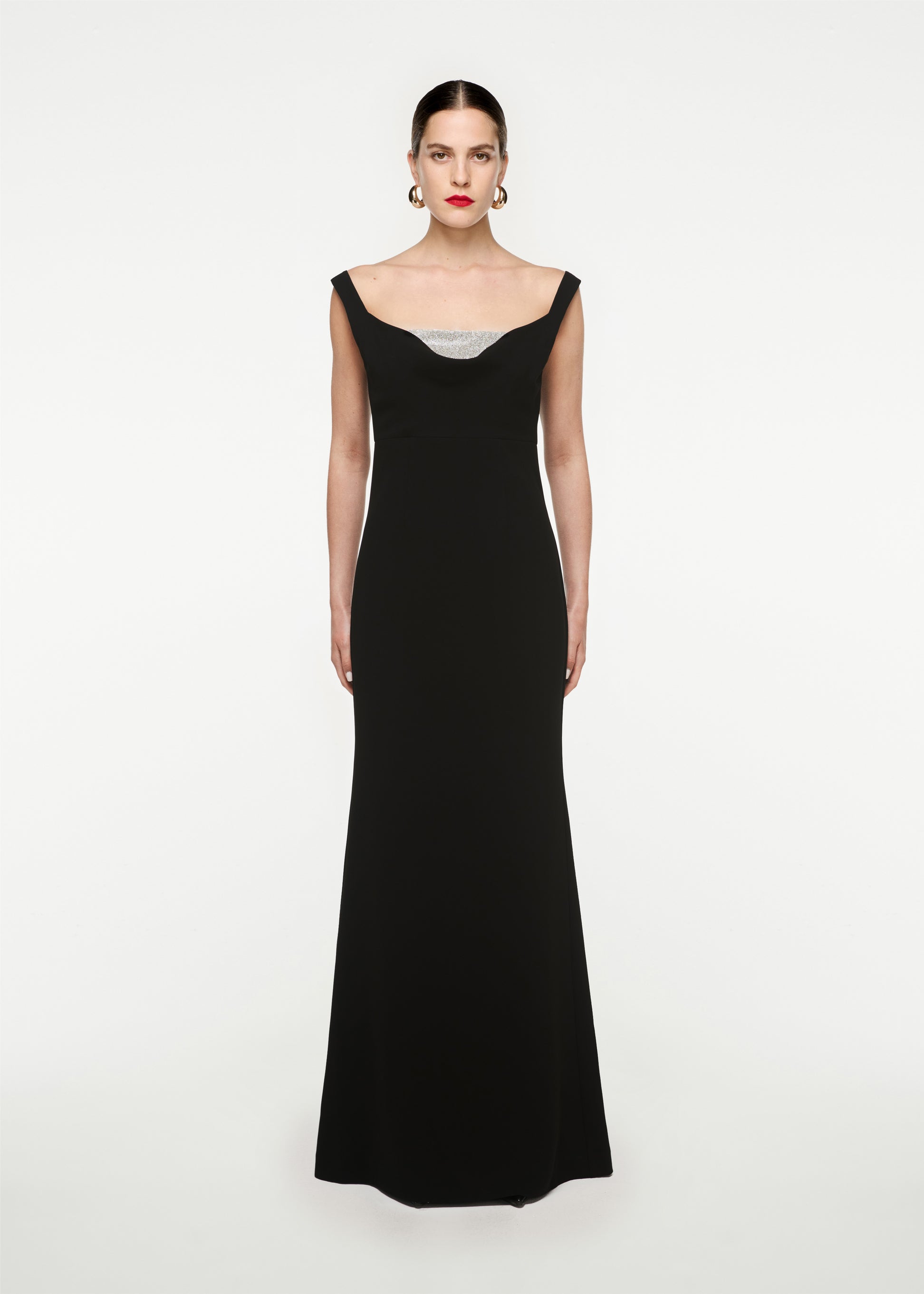 Woman wearing the Off Shoulder Cady Diamante Gown in Black