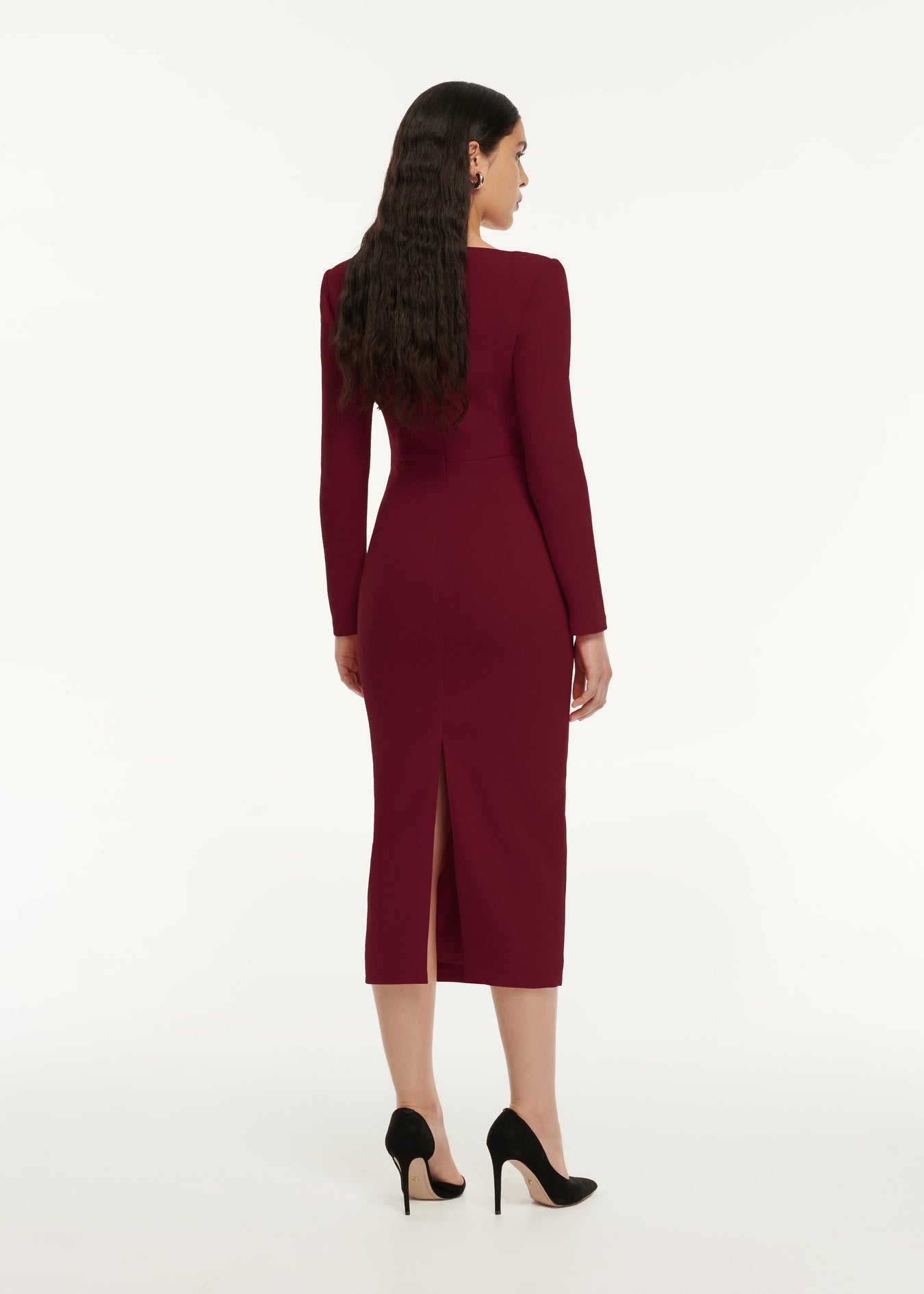 A back view image of a model wearing the Flower Detail Midi Dress in Maroon