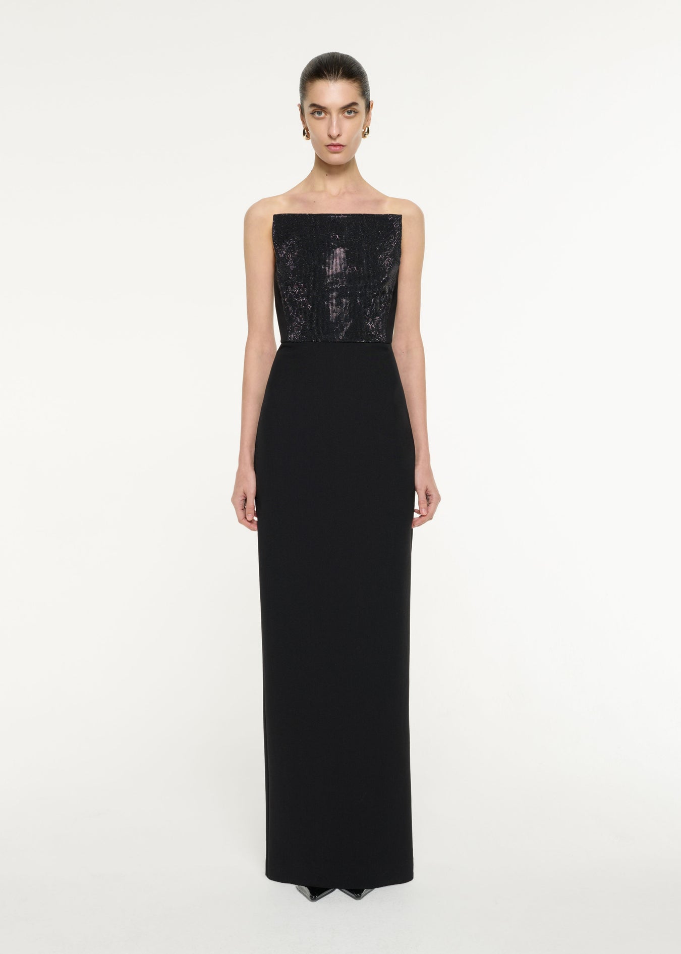 Front view of a model wearing the Diamante Panel Gown in Black