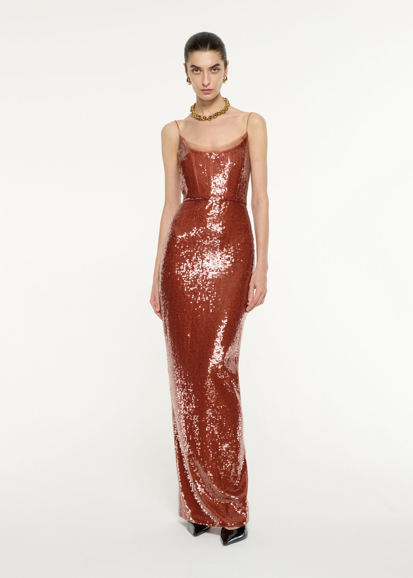 Front view of a model wearing the Sequin Gown in Copper 