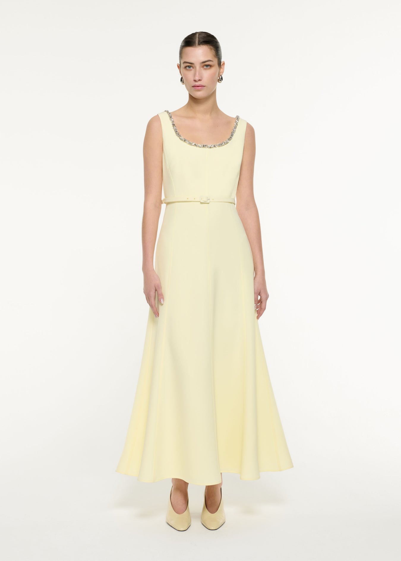 Front view of a model wearing the Embellished Heavy Cady Maxi Dress in Light Yellow