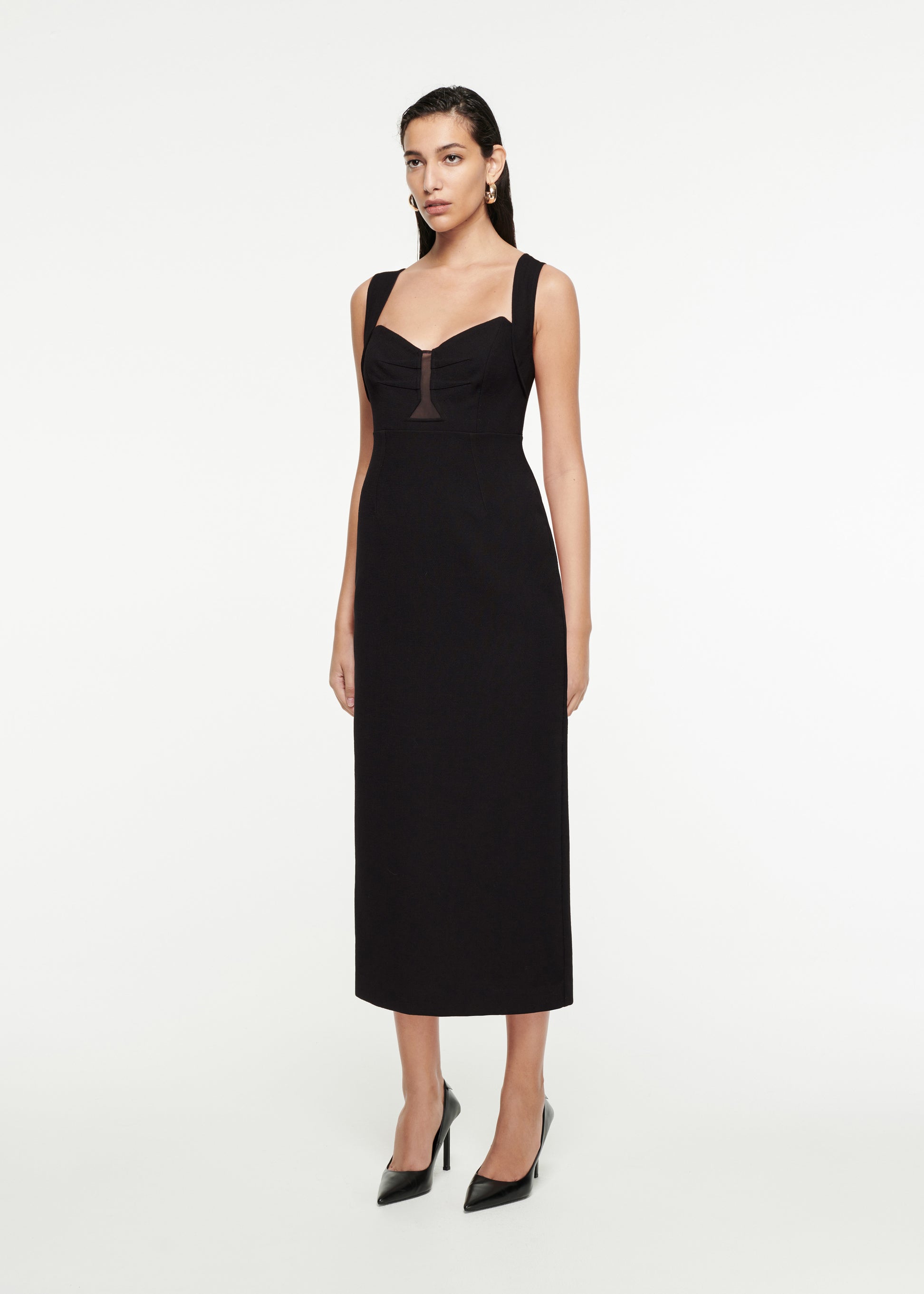 Woman wearing the Wool Crepe Midi Dress in Black