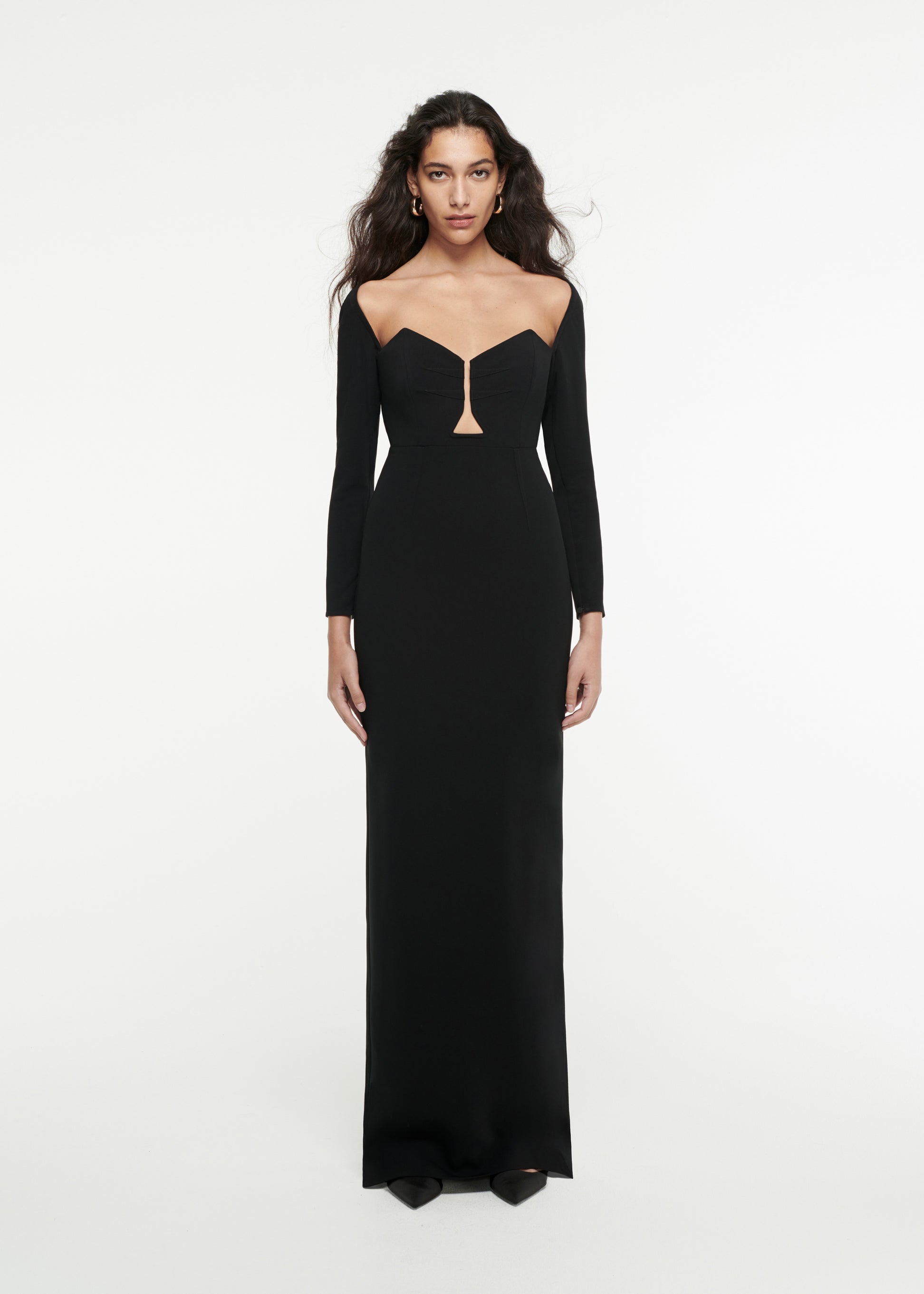 Woman wearing the Long Sleeve Stretch-Cady Gown in Black 