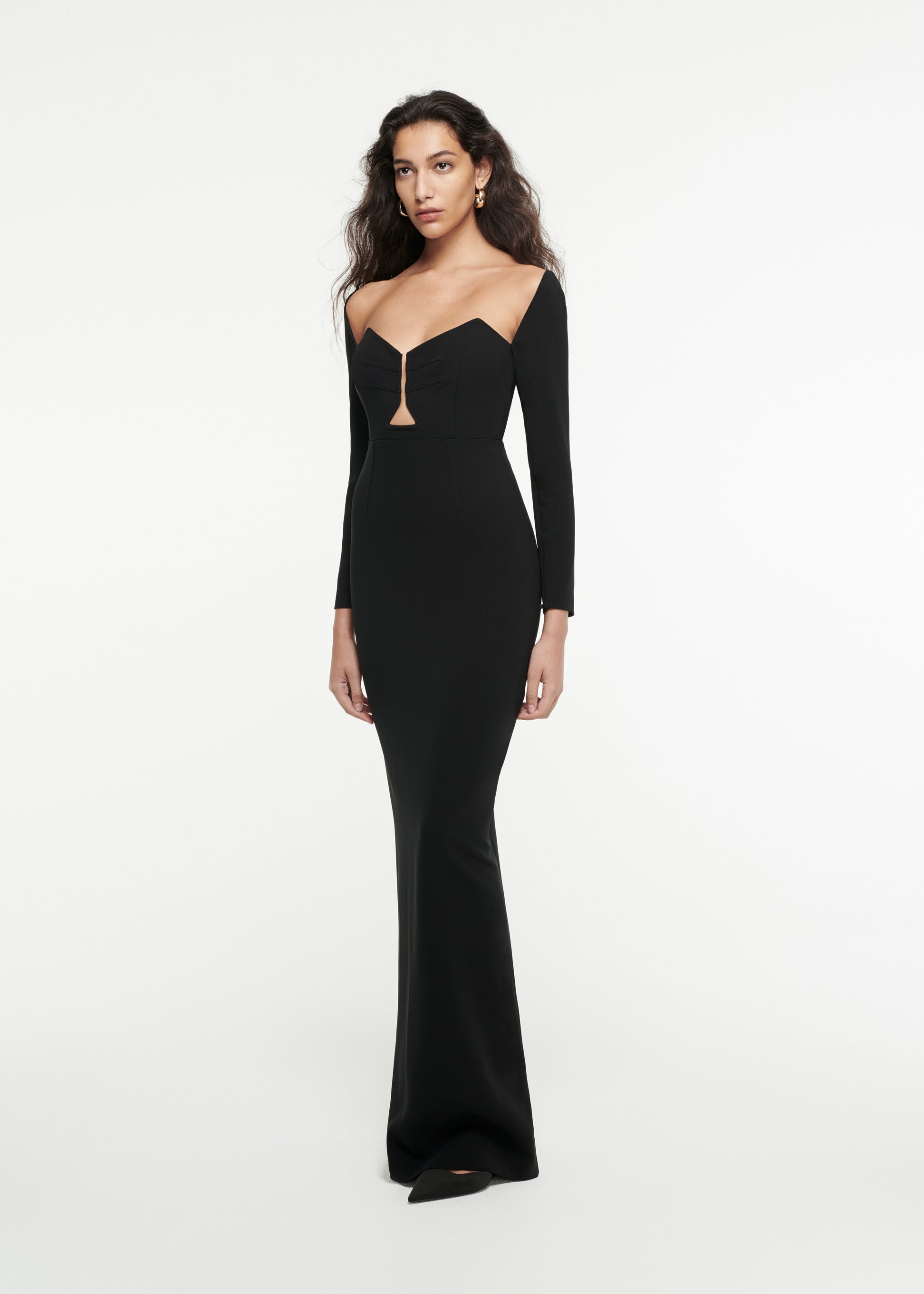 Woman wearing the Long Sleeve Stretch-Cady Gown in Black 