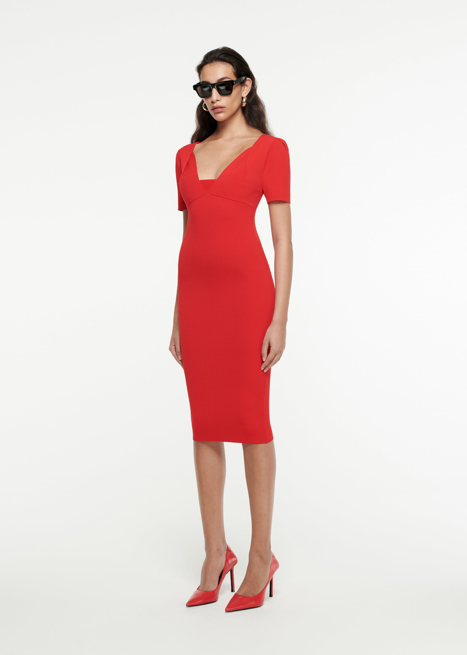 Woman wearing the Short Sleeve Knit Midi Dress in Red