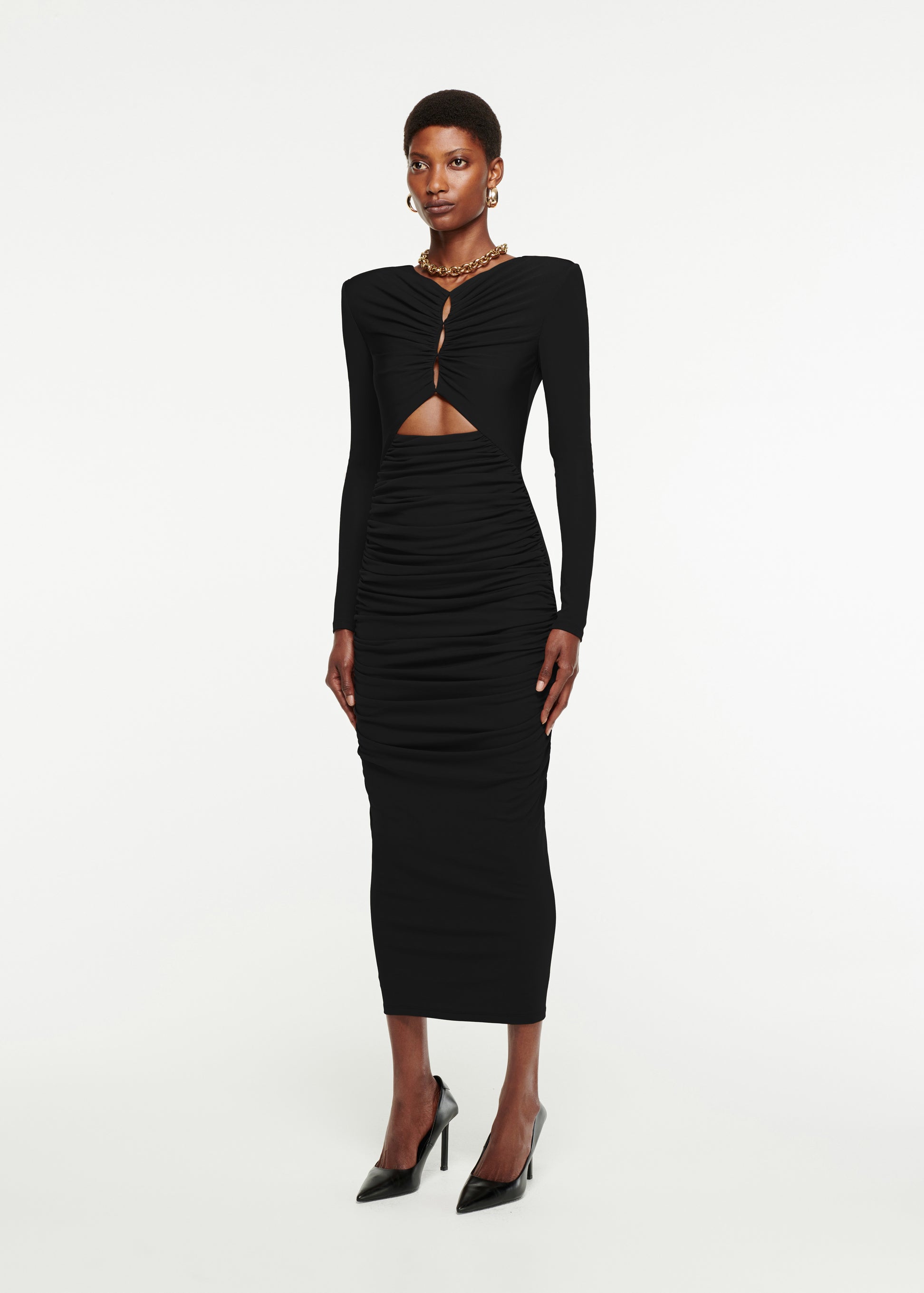 Woman wearing the Long Sleeve Ruched Jersey Midi Dress in Black 