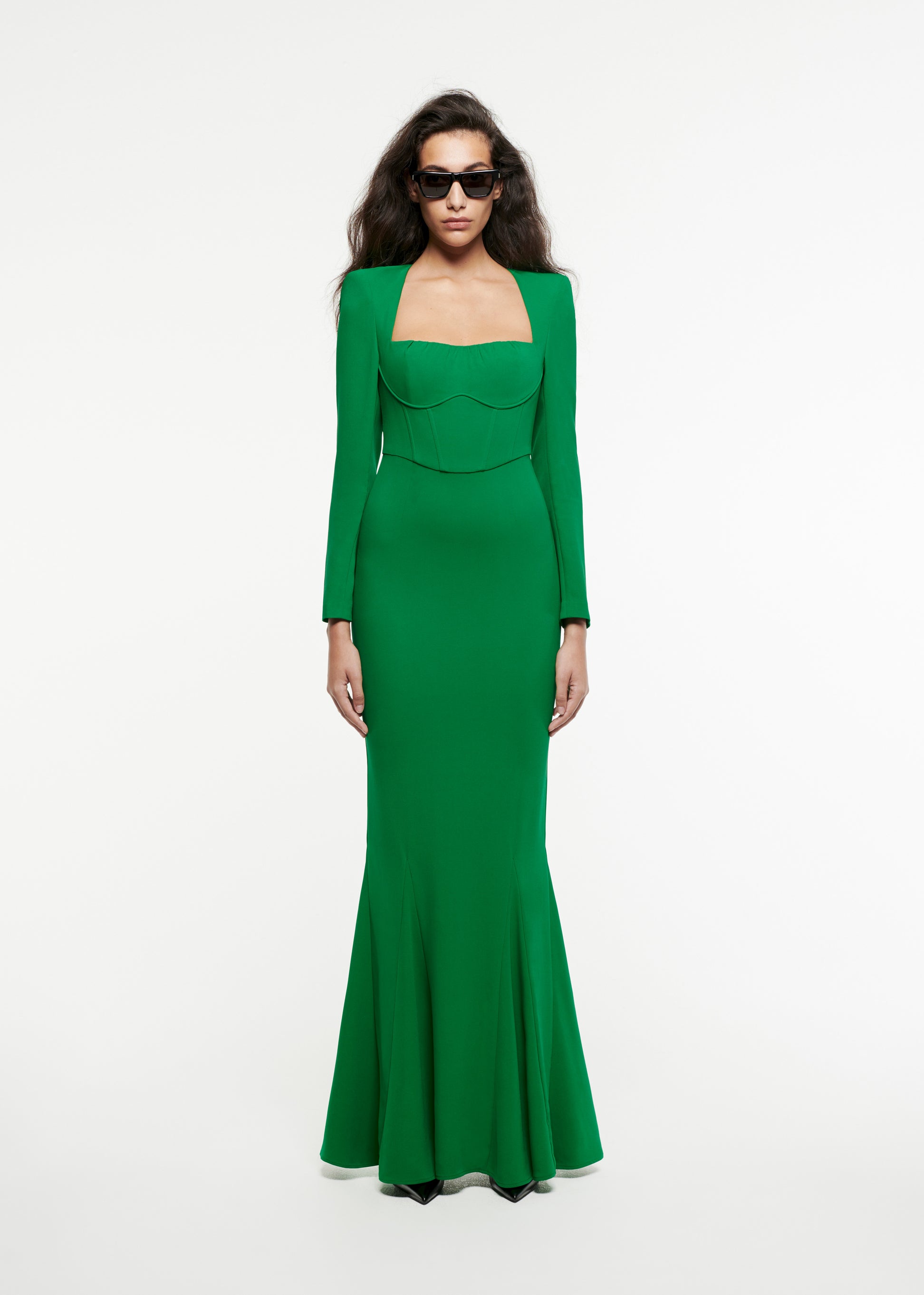 Woman wearing the Long Sleeve Stretch-Cady Gown in Green