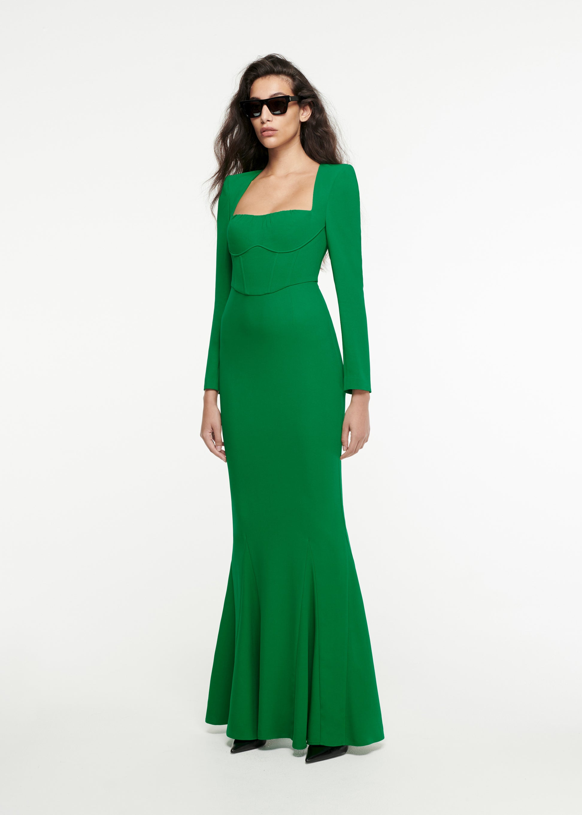 Woman wearing the Long Sleeve Stretch-Cady Gown in Green