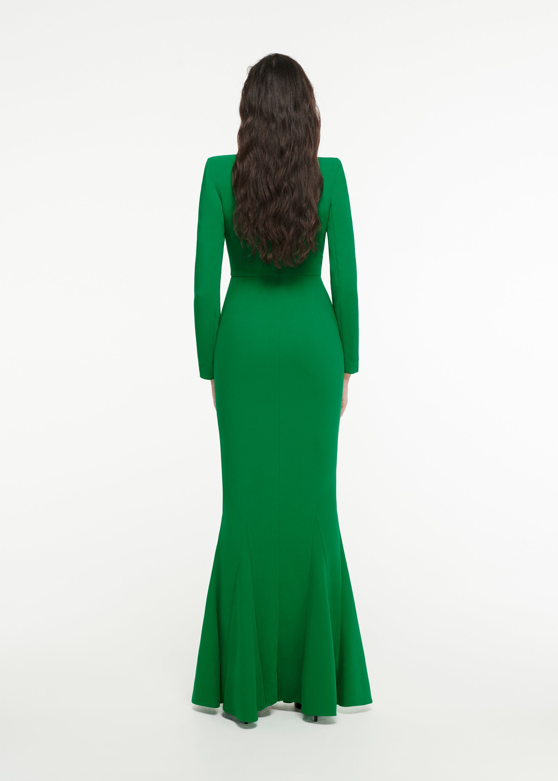 The back of a woman wearing the Long Sleeve Stretch-Cady Gown in Green