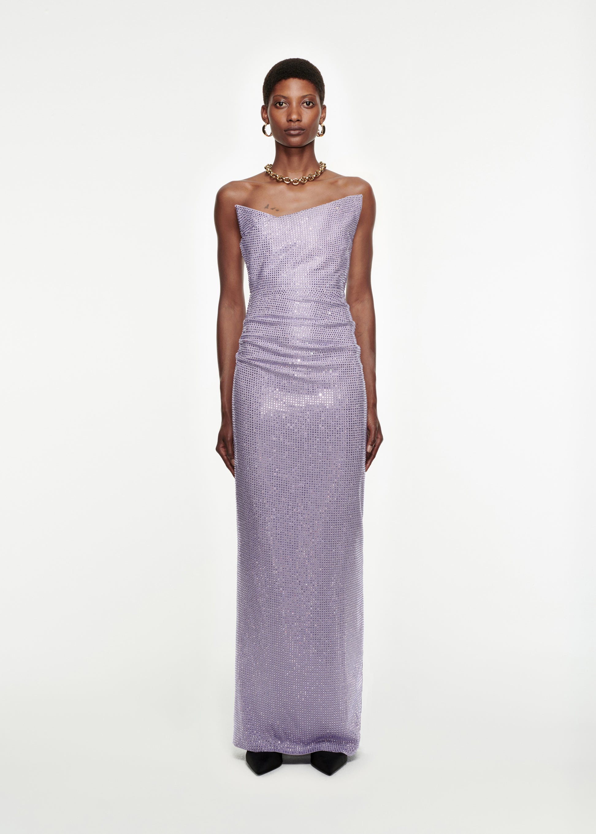 Woman wearing the Asymmetric Diamanté Gown in Lilac