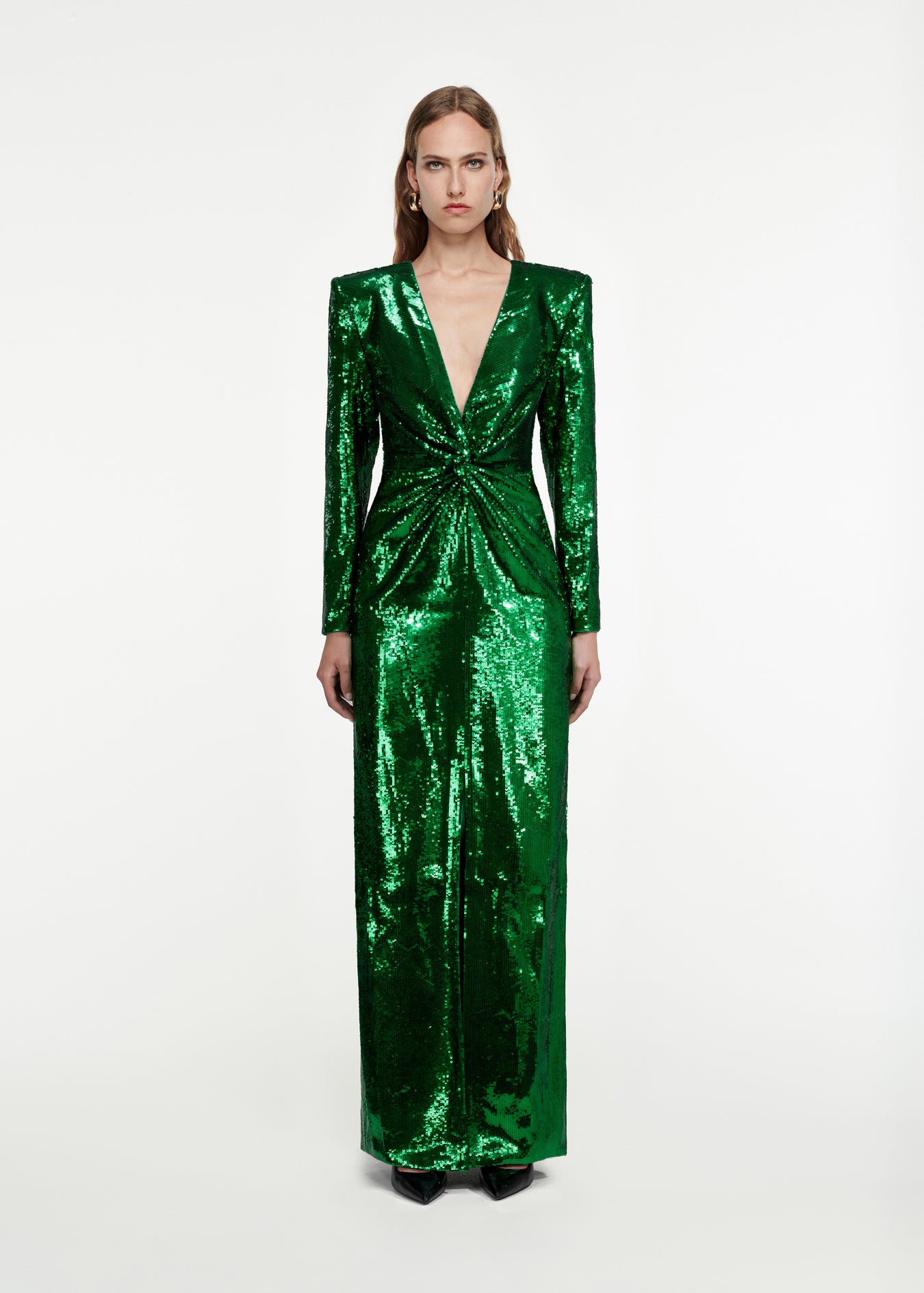 Woman wearing the Twist-Front Sequin Gown in Green