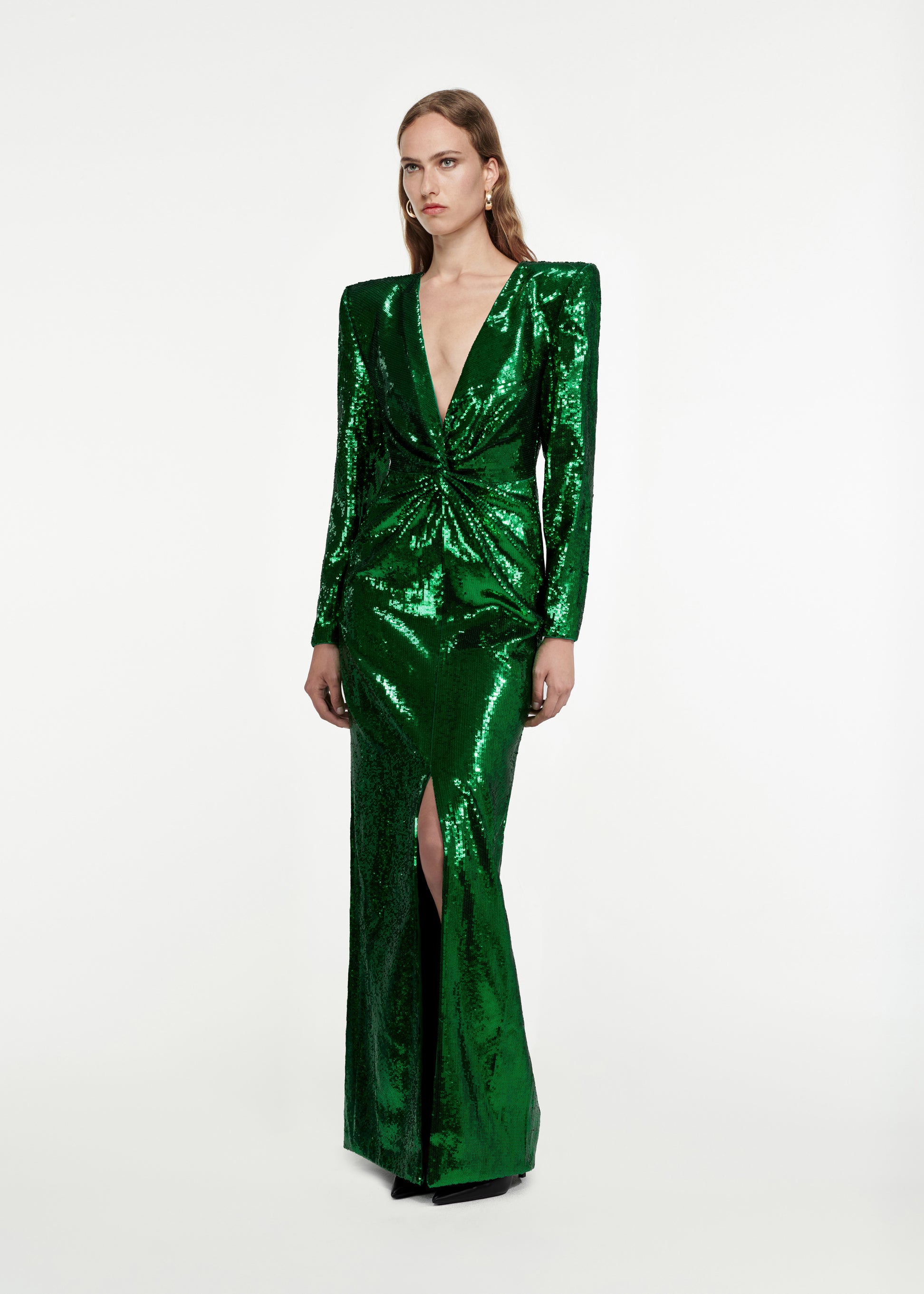 Woman wearing the Twist-Front Sequin Gown in Green