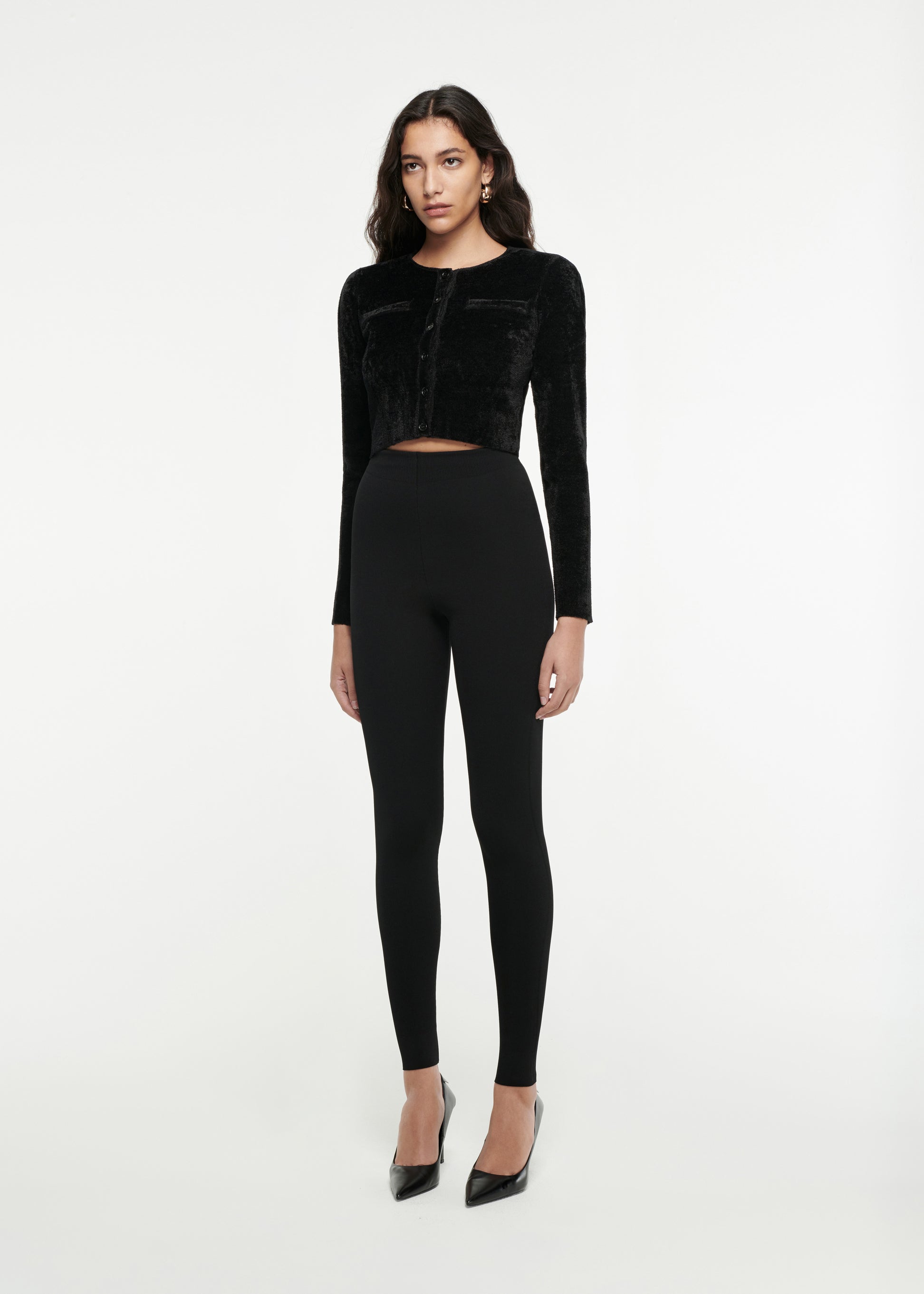 Woman wearing the Cropped Chenille Knit Cardigan in Black