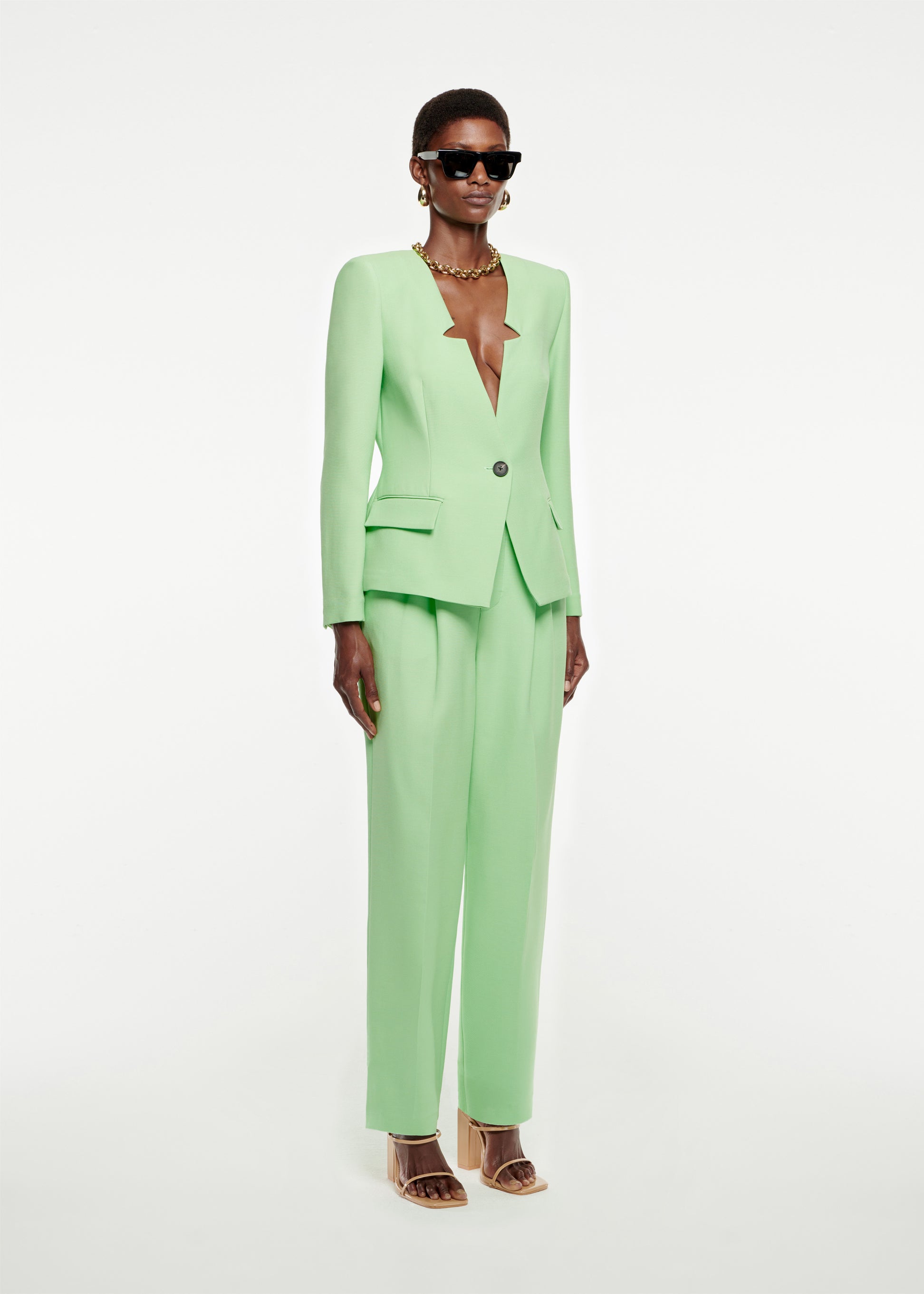 Woman wearing the Silk Wool Blazer in Green