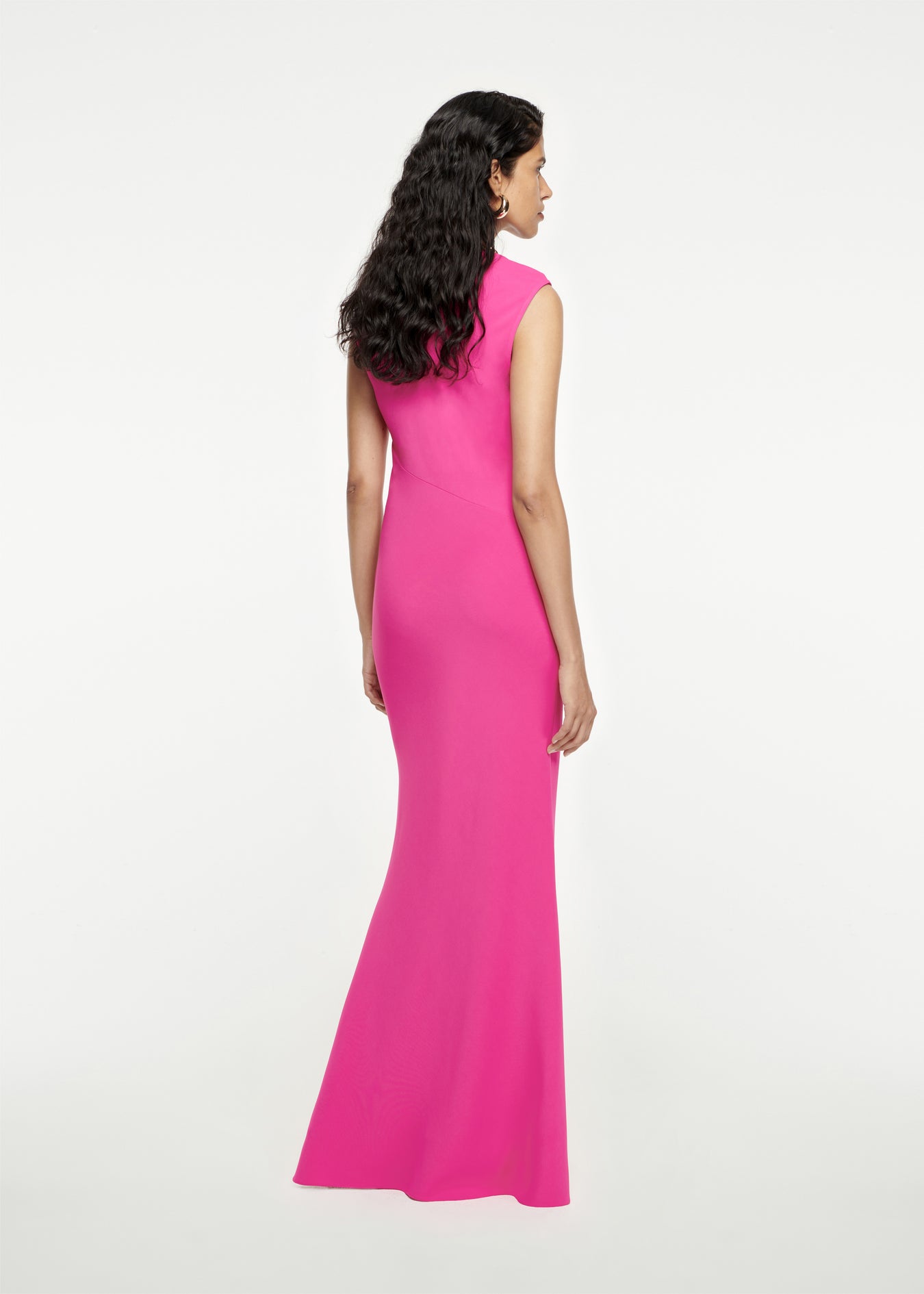 The back of a woman wearing the Stretch-Cady Maxi Dress in Pink