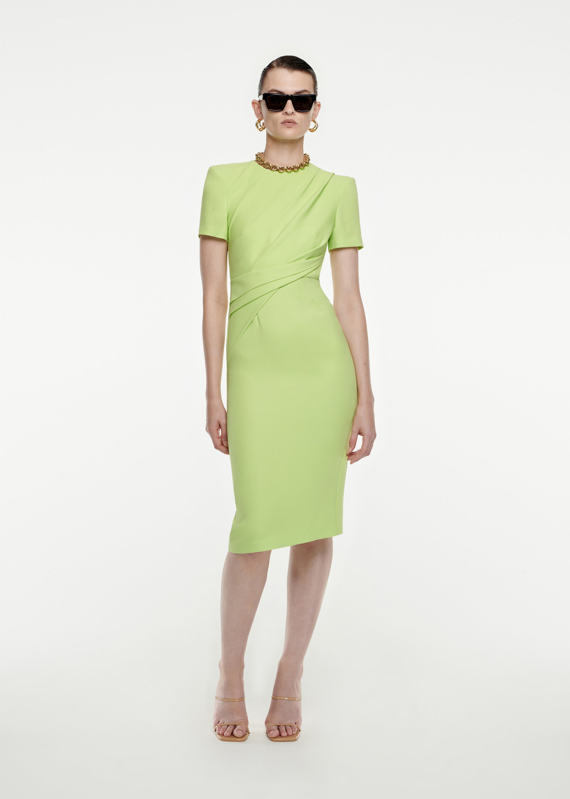 Woman wearing the Short Sleeve Silk Wool Midi Dress in Green